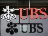 FILE - In this Feb. 12, 2009 file photo, the logo of the Swiss bank UBS, is seen in Aarau, Switzerland. The U.S. government and Swiss banking giant UBS AG have reached a long-awaited agreement in a case over secret Swiss bank accounts for alleged American tax evaders, lawyers for both sides told a federal judge Wednesday, Aug. 12, 2009. (AP Photo/Keystone, Alessandro Della Bella, File)