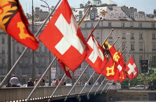 Swiss flags flying in Geneva --- Image by © Royalty-Free/Corbis tumblr_maiqfo9Vq71qf5nfp.jpg